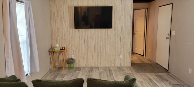 15951 NW 44th Avenue Rd, Reddick, FL 32686 - living room featuring wood finished floors and wooden walls