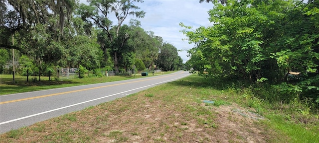 15951 NW 44th Avenue Rd, Reddick, FL 32686 - view of asphalt road with view of scattered trees
