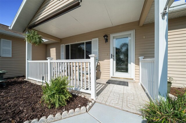 entrance to property with a porch