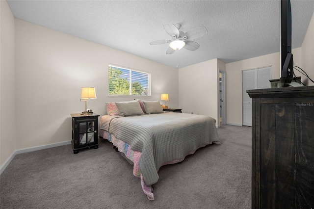 bedroom with carpet flooring, baseboards, ceiling fan, and a textured ceiling