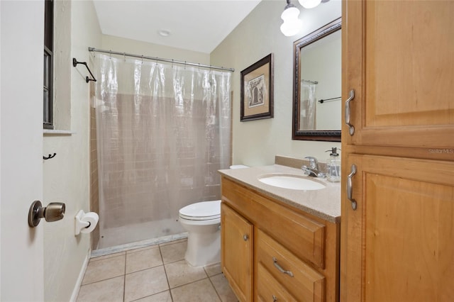 bathroom with tile patterned flooring, toilet, vanity, and curtained shower