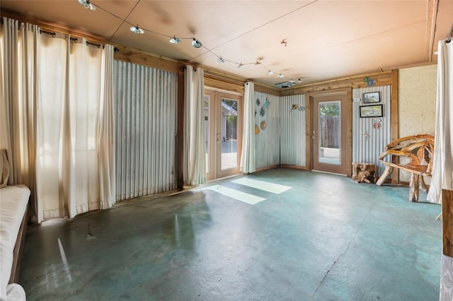 miscellaneous room with concrete flooring