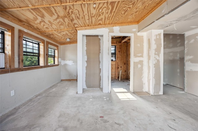 spare room with wood ceiling