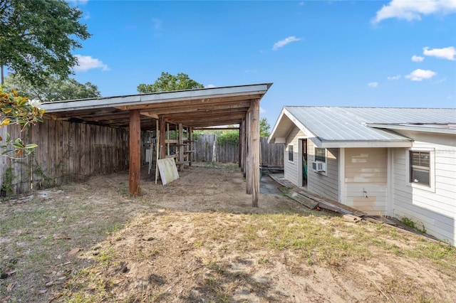 view of yard with fence and cooling unit