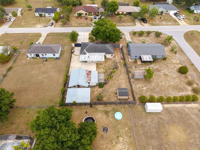 aerial view of property's location featuring nearby suburban area