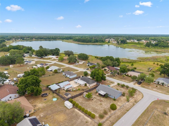 aerial view of residential area with a nearby body of water