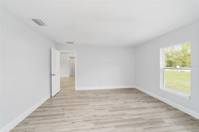 13505 SW 112th Pl, Dunnellon, FL 34432 - unfurnished room with baseboards and light wood finished floors