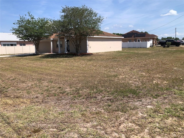 view of yard featuring fence