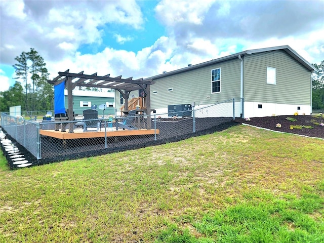 7030 SE 120th Ct, Morriston, FL 32668 - rear view of house with a yard, a pergola, and fence