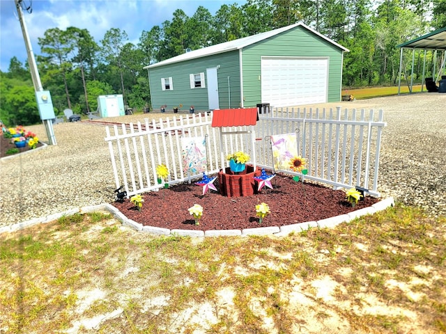 7030 SE 120th Ct, Morriston, FL 32668 - view of yard featuring a playground, fence, an outbuilding, and a detached garage