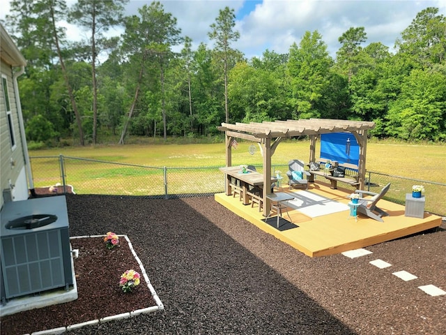 7030 SE 120th Ct, Morriston, FL 32668 - view of yard featuring a pergola, fence, a wooden deck, and cooling unit