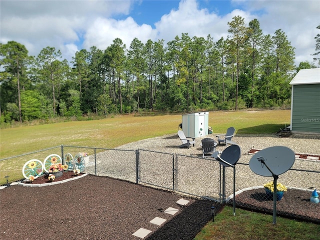 7030 SE 120th Ct, Morriston, FL 32668 - view of yard with a fire pit and fence