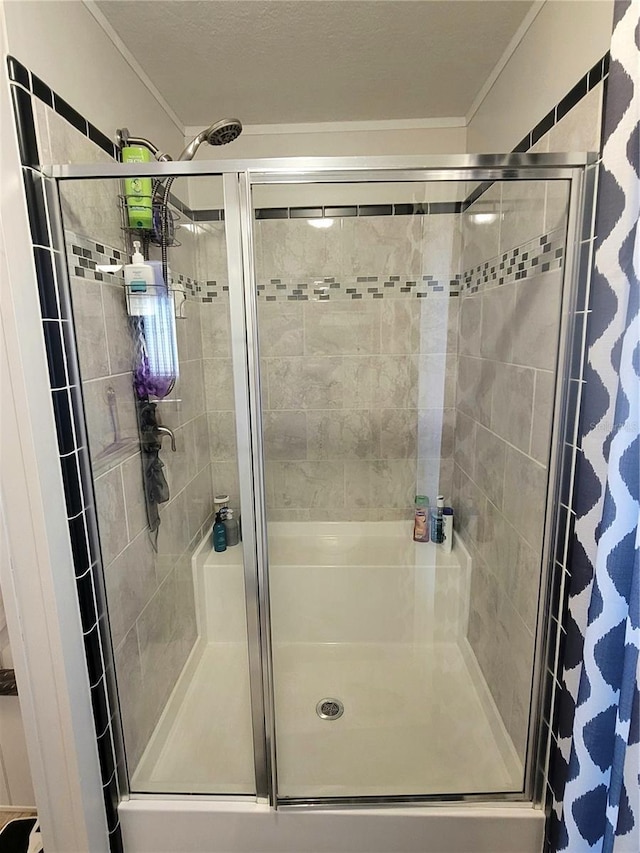 7030 SE 120th Ct, Morriston, FL 32668 - bathroom featuring ornamental molding and a shower stall