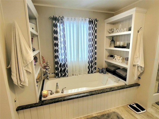 7030 SE 120th Ct, Morriston, FL 32668 - bathroom with a garden tub and wood finished floors