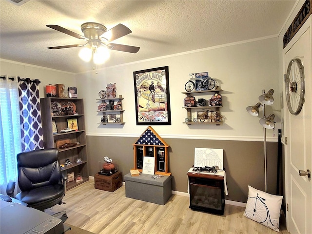 7030 SE 120th Ct, Morriston, FL 32668 - office space featuring a textured ceiling, ornamental molding, a ceiling fan, and wood finished floors