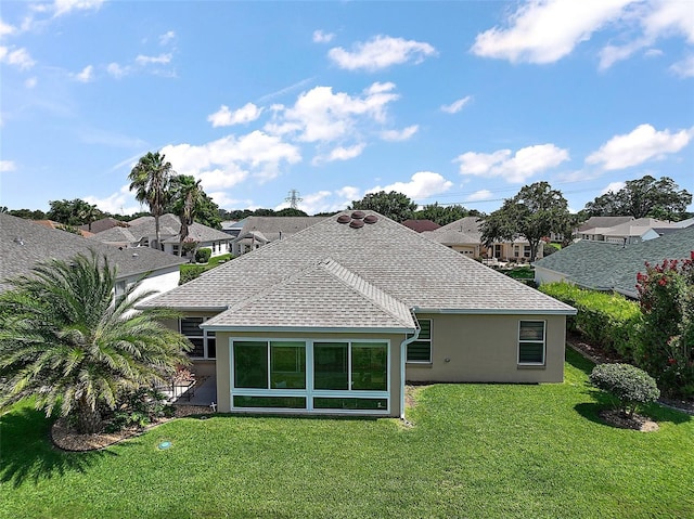 8545 SE 168th Kittredge Loop, The Villages, FL 32162 - rear view of house with a yard, stucco siding, a shingled roof, and a residential view