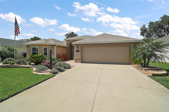 8545 SE 168th Kittredge Loop, The Villages, FL 32162 - ranch-style home with concrete driveway, stucco siding, an attached garage, and a front lawn