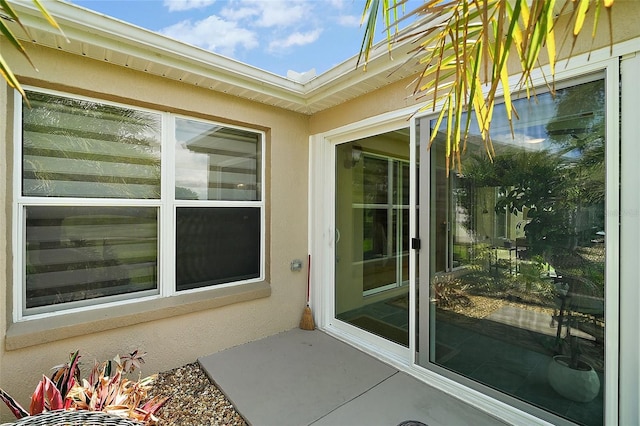 8545 SE 168th Kittredge Loop, The Villages, FL 32162 - property entrance with stucco siding