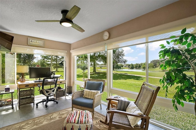 8545 SE 168th Kittredge Loop, The Villages, FL 32162 - sunroom / solarium featuring plenty of natural light, a textured ceiling, and tile patterned floors