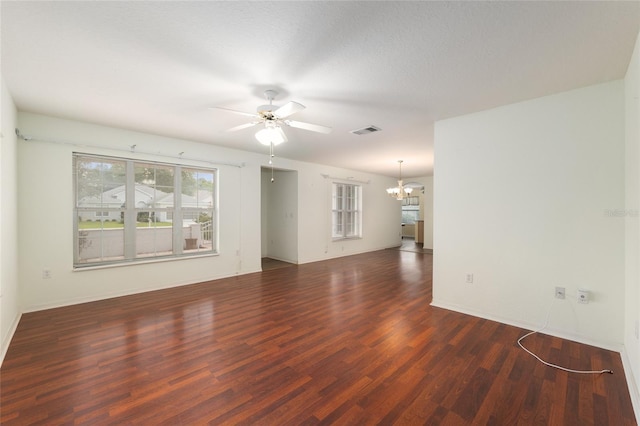 11146 SW 68th Ct, Ocala, FL 34476 - empty room with visible vents, baseboards, ceiling fan with notable chandelier, and wood finished floors