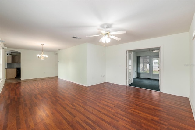 11146 SW 68th Ct, Ocala, FL 34476 - empty room with visible vents, baseboards, ceiling fan with notable chandelier, and wood finished floors