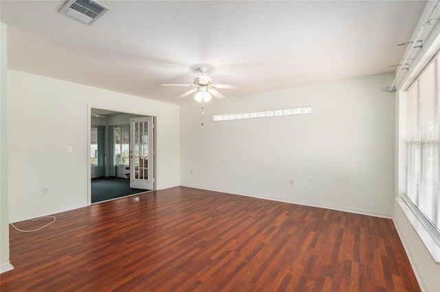 11146 SW 68th Ct, Ocala, FL 34476 - spare room featuring ceiling fan, visible vents, a wealth of natural light, and wood finished floors