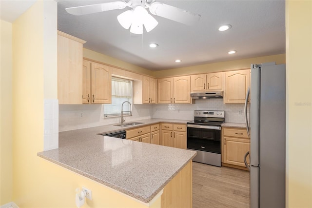 11146 SW 68th Ct, Ocala, FL 34476 - kitchen featuring light brown cabinetry, a sink, stainless steel appliances, a peninsula, and under cabinet range hood