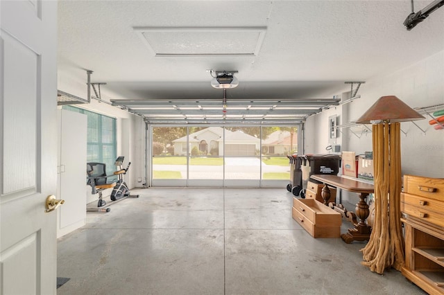 11146 SW 68th Ct, Ocala, FL 34476 - garage featuring a garage door opener