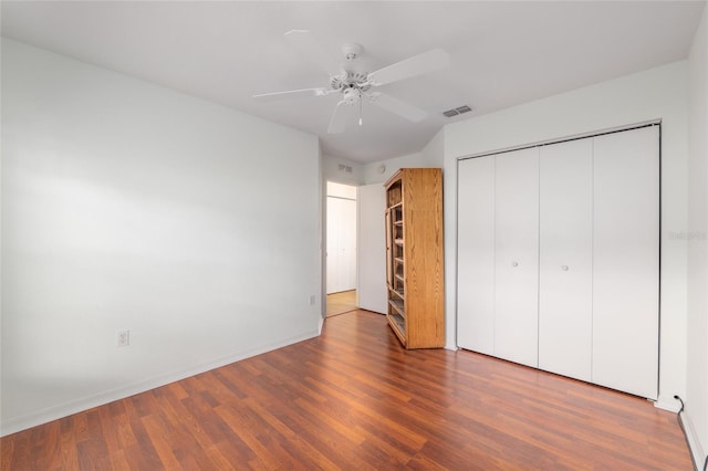 11146 SW 68th Ct, Ocala, FL 34476 - unfurnished bedroom with visible vents, baseboards, wood finished floors, and a closet