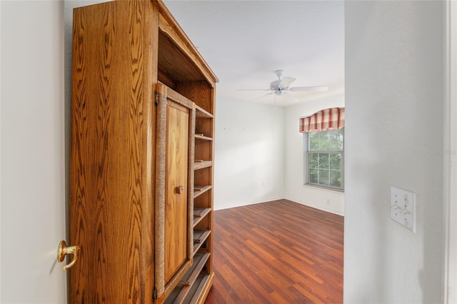 11146 SW 68th Ct, Ocala, FL 34476 - empty room featuring baseboards, a ceiling fan, and dark wood-style flooring