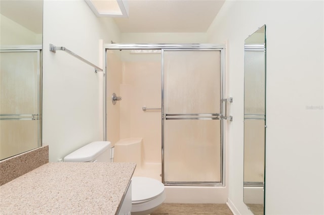 11146 SW 68th Ct, Ocala, FL 34476 - bathroom featuring an enclosed shower, toilet, and vanity
