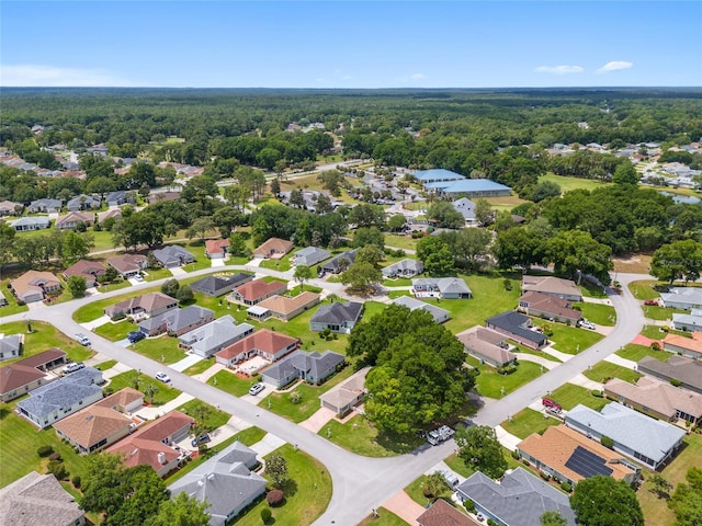 11146 SW 68th Ct, Ocala, FL 34476 - drone / aerial view featuring a forest view and a residential view