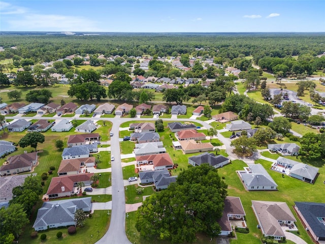 11146 SW 68th Ct, Ocala, FL 34476 - bird's eye view with a residential view and a wooded view
