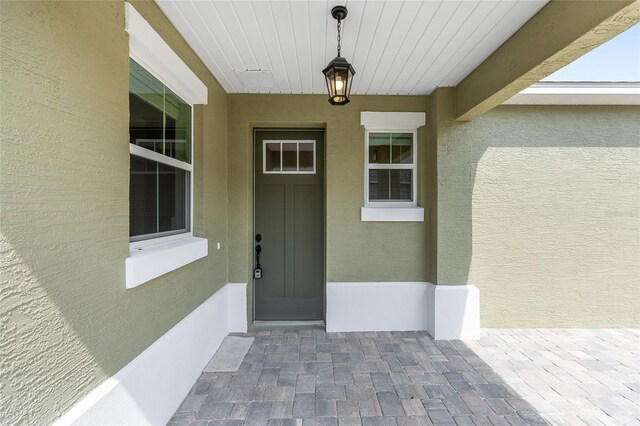 10347 SW 99th Ln, Ocala, FL 34481 - property entrance with stucco siding