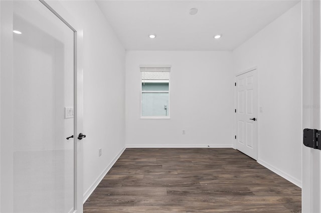 10347 SW 99th Ln, Ocala, FL 34481 - unfurnished room with dark wood-style floors, recessed lighting, and baseboards