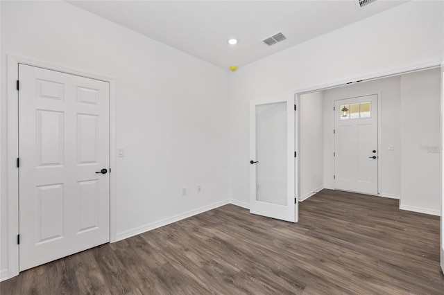 10347 SW 99th Ln, Ocala, FL 34481 - unfurnished bedroom with wood finished floors, baseboards, and recessed lighting