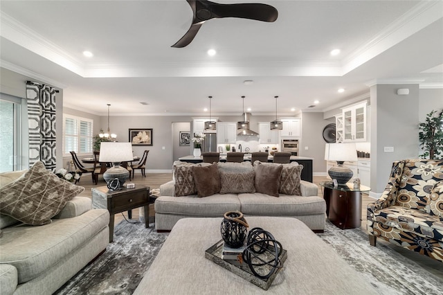 10082 SW 82nd Place Rd, Ocala, FL 34481 - living area featuring light wood-style floors, a ceiling fan, recessed lighting, baseboards, and a raised ceiling