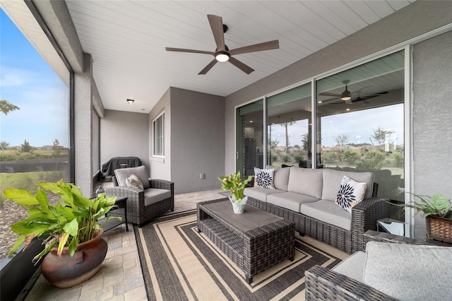 10082 SW 82nd Place Rd, Ocala, FL 34481 - sunroom featuring ceiling fan and outdoor lounge area
