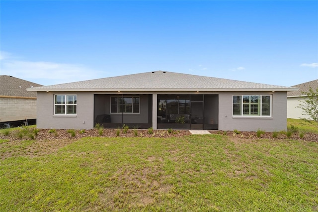 10082 SW 82nd Place Rd, Ocala, FL 34481 - back of house featuring a sunroom, a yard, stucco siding, and roof with shingles