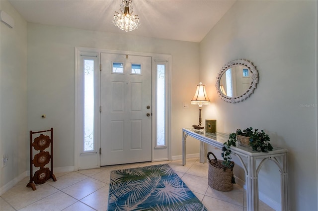 15691 SW 11th Court Rd, Ocala, FL 34473 - foyer with an inviting chandelier, baseboards, and light tile patterned floors