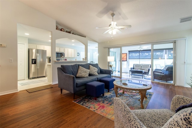 15691 SW 11th Court Rd, Ocala, FL 34473 - living room with visible vents, lofted ceiling, arched walkways, a ceiling fan, and light wood-style flooring