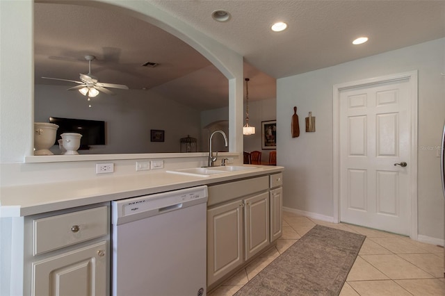 15691 SW 11th Court Rd, Ocala, FL 34473 - kitchen with a ceiling fan, arched walkways, a sink, dishwasher, and vaulted ceiling