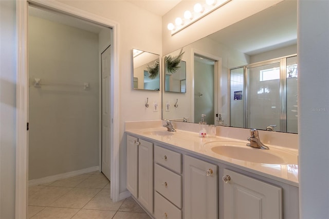 15691 SW 11th Court Rd, Ocala, FL 34473 - bathroom with double vanity, a sink, tile patterned floors, and a shower stall