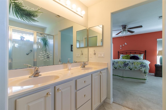 15691 SW 11th Court Rd, Ocala, FL 34473 - ensuite bathroom with a sink, ensuite bathroom, a shower stall, and a ceiling fan