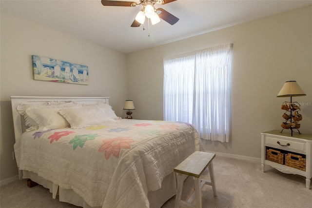 15691 SW 11th Court Rd, Ocala, FL 34473 - bedroom featuring baseboards, ceiling fan, and light carpet