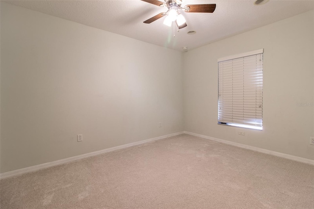 15691 SW 11th Court Rd, Ocala, FL 34473 - empty room with carpet flooring, a ceiling fan, and baseboards