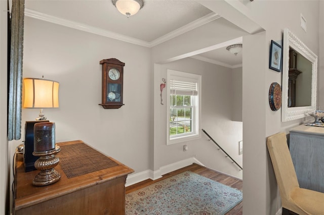 536 NW 7th Ave, Crystal River, FL 34428 - interior space featuring crown molding, baseboards, an upstairs landing, and wood finished floors
