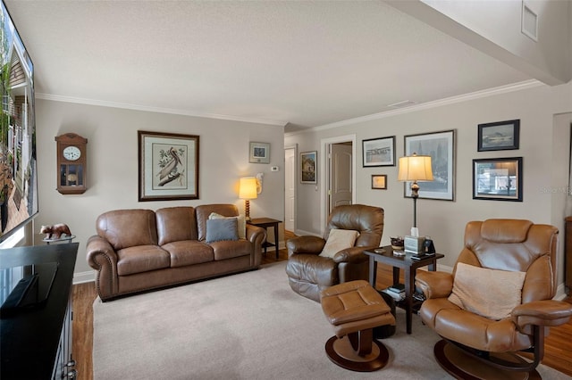 536 NW 7th Ave, Crystal River, FL 34428 - living area featuring visible vents, ornamental molding, baseboards, and wood finished floors