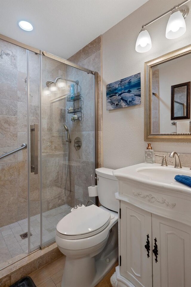 536 NW 7th Ave, Crystal River, FL 34428 - full bathroom featuring vanity, toilet, and a shower stall