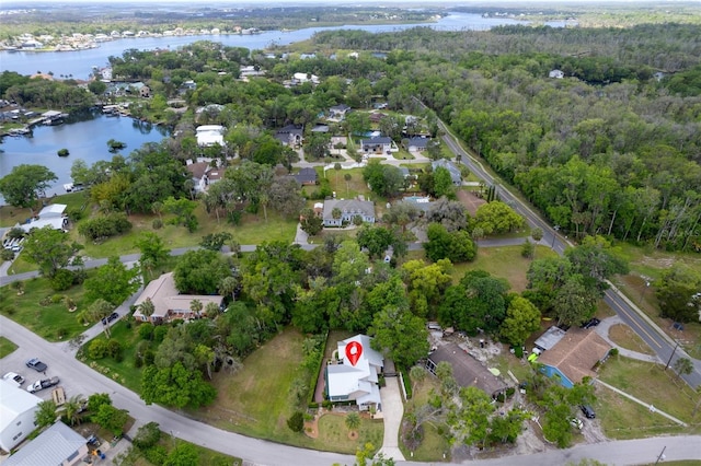 536 NW 7th Ave, Crystal River, FL 34428 - birds eye view of property with a water view, a residential view, and a forest view